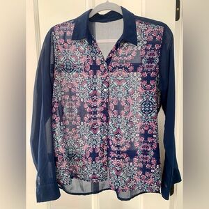 Semi transparent blue blouse with floral pattern upfront